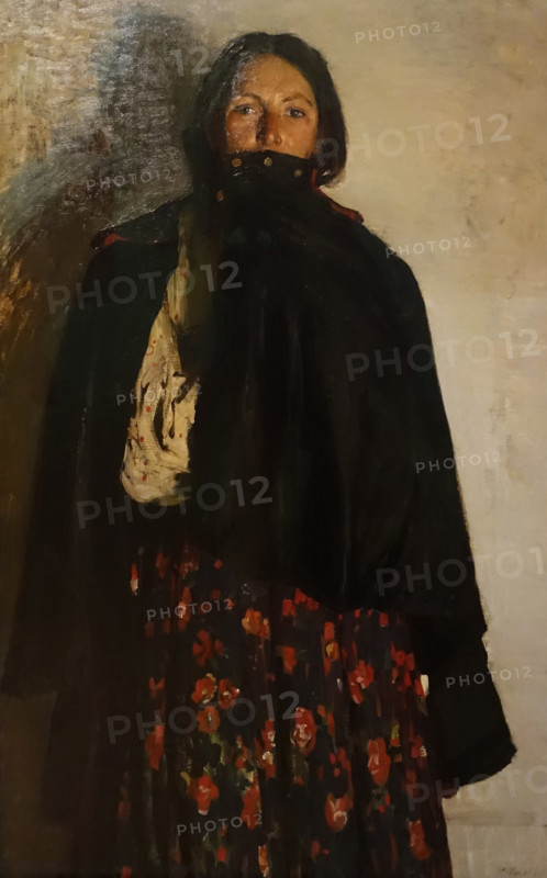 Peasant woman covering her mouth with a overcoat