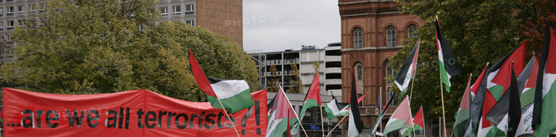 Berlin, Germany, 25 October 2025. Palestinian flags during a protest demonstration against Israeli bombing in Gaza, in front of the Red Town Hall (Rotes Rathaus).