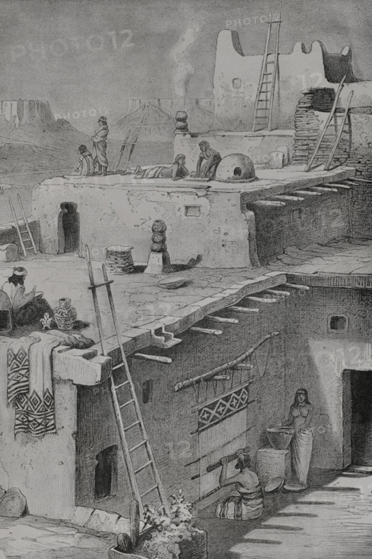 Houses in a Pueblo Indians village. Drawing by Rudolf Cronau (1855-1939). Engraving. America. History of its discovery from primitive times to the modern era, written by Rodolfo Cronau. Volume II. Published in Barcelona, 1892.