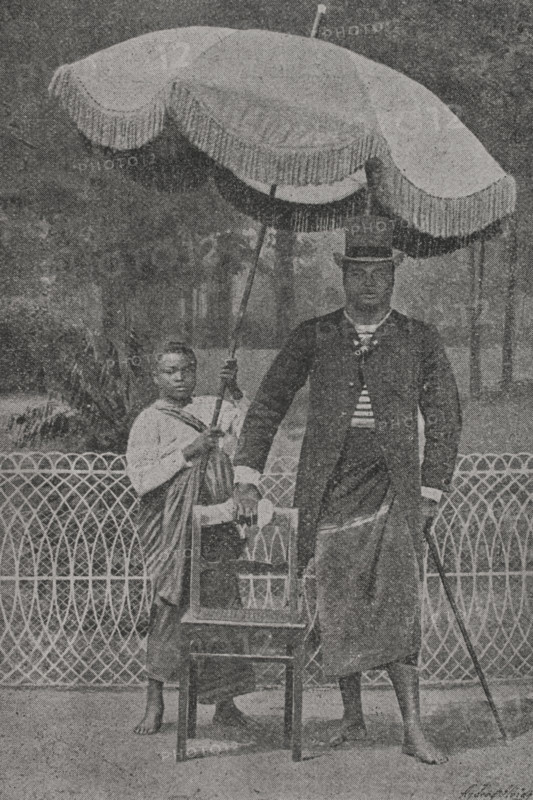 Chief Samson Dido of Didotown. Prince of the Duala ethnic group from Cameroon. Important figure in relations between Germany and German Cameroon (Africa), a protectorate of the German Empire between 1884 and 1916. Hired by German businessman Carl Hagenbeck, in 1886 he travelled to Germany to show the German people the customs and traditions of Cameroon, taking part with his family in ethnographic exhibitions for several months. Prince Samson Dido in ""Flora Charlottenburg"" in Belin, 1886. Portrait. Photogravure by Andre & Sleigh from a photograph by Augerer. ""La conquista de Africa"" (The conquest of Africa), by Alfredo Opisso. Volume II. Published in Barcelona (Spain) by Molinas y Maza editores, 1911.