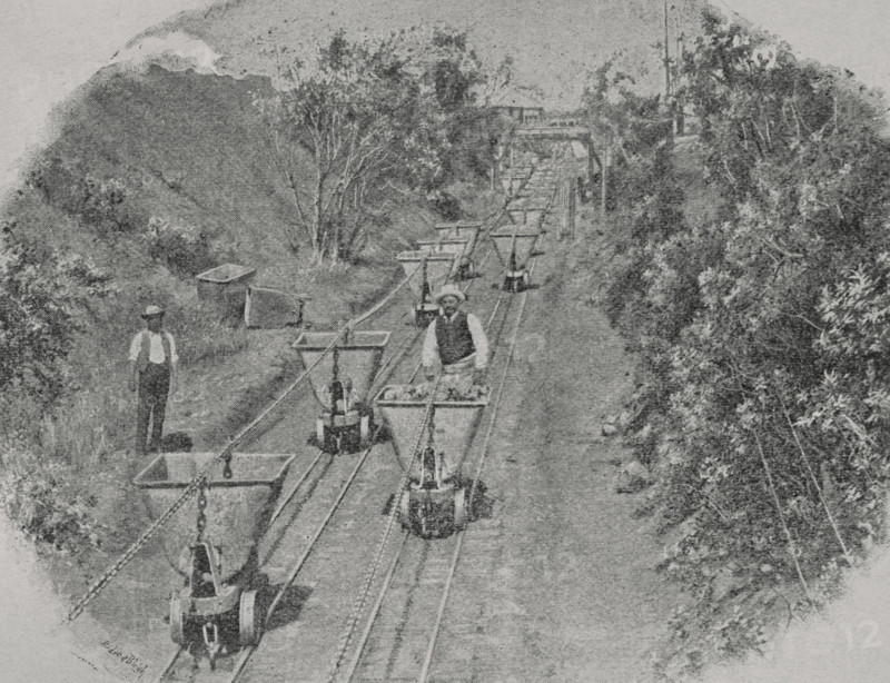 Kimberley, South Africa. De Beers Mine. Mechanical haulage of the ''blue'' clay to the drying-ground. Photogravure by Andre & Sleigh from a photograph by J.K. Middlebrook. ""La conquista de Africa"" (The conquest of Africa), by Alfredo Opisso. Volume II. Published in Barcelona (Spain) by Molinas y Maza editores, 1911.