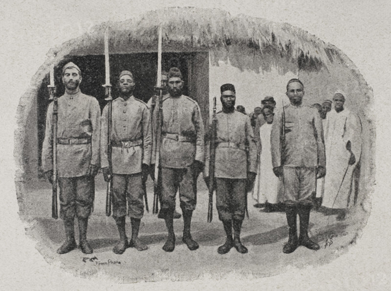 Kenya. Local police in Mombasa, c. 1892. Photogravure from photograph taken for the Imperial British East Africa Company. ""La conquista de Africa"" (The conquest of Africa), by Alfredo Opisso. Volume III. Published in Barcelona (Spain) by Molinas y Maza editores, 1911.