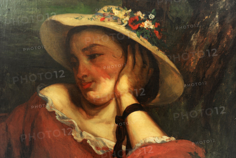 Gustave Courbet (1819-1877). French painter. Woman in a Straw Hat with Flowers, 1857. Oil on canvas. National Gallery Prague. Czech Republic.