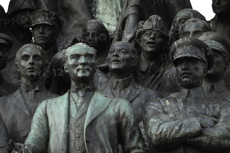 Istanbul, Turkey. Reoublic Monument (Cumhuriyet Anƒ±tƒ±), executed in 1928 by Pietro Canonica (1869-1959). It was inaugurated in Taksim Square (Taksim Meydanƒ±) in 1928 to commemorate the fifth anniversary of the founding of the Republic of Turkey in 1923 after the Turkish War of Independence. Detail of the bronze sculptural group featuring Kemal Ataturk, Ismet Inonu and field marshal Fevzi váakmak (wearing uniform).