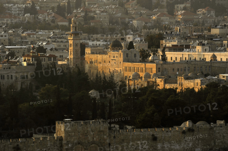 Jerusalem, Israel. Walls and the Old City at sunset.