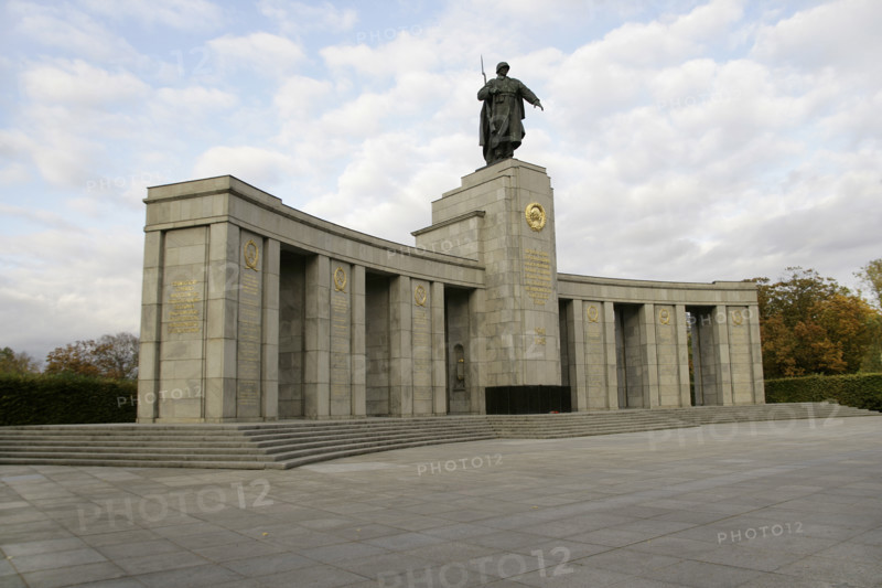 Berlin, Germany. Soviet War Memorial in the Tiergarten (Sowjetisches Kriegerdenkmal). Memorial inaugurated on 7 November 1945, on the anniversary of the beginning of the October Revolution in Russia. It commemorates Soviet soldiers who died in the war, especially those who died during the Battle of Berlin, which took place between April and May 1945. The monument is located in the Grosser Tiergarten, a large public park in the west of the city. It was built with stone from the destroyed Chancellery of the Third Reich. Its design was the work of architect Mikhail Gorvits. The statue of the Soviet soldier was created by sculptors Vladimir Tsigal (1917-2013) and Lev Kerbel (1917-2003).