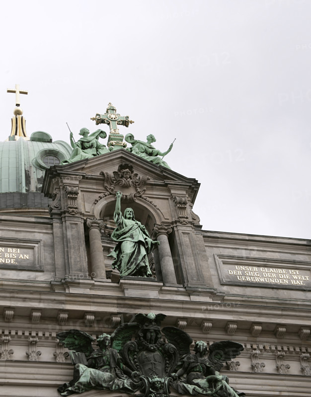 Germany. Berlin Cathedral (Berliner Dom). Temple inaugurated in 1905. It was built by order of Emperor Wilhelm II (1859-1941) between 1894 and 1905, under the direction of German architect Julius Carl Raschdorff (1823-1914). Also known as the Evangelical Supreme Parish and Collegiate Church, it is a monumental German Protestant church and dynastic tomb (House of Hohenzollern). Statue of Christ blessing the city of Berlin, atop the main facade. Sculpted in copper by Fritz Schapper (1841-1919). Above it stands a cross adorned with angels on either side.