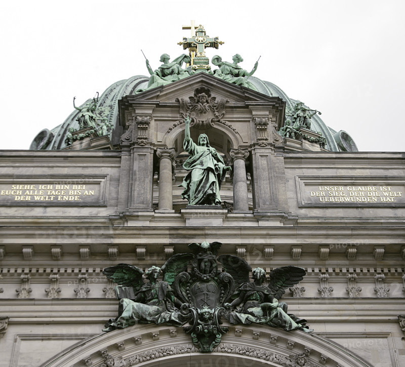 Germany. Berlin Cathedral (Berliner Dom). Temple inaugurated in 1905. It was built by order of Emperor Wilhelm II (1859-1941) between 1894 and 1905, under the direction of German architect Julius Carl Raschdorff (1823-1914). Also known as the Evangelical Supreme Parish and Collegiate Church, it is a monumental German Protestant church and dynastic tomb (House of Hohenzollern). Statue of Christ blessing the city of Berlin, atop the main facade. Sculpted in copper by Fritz Schapper (1841-1919). Above it stands a cross adorned with angels on either side.