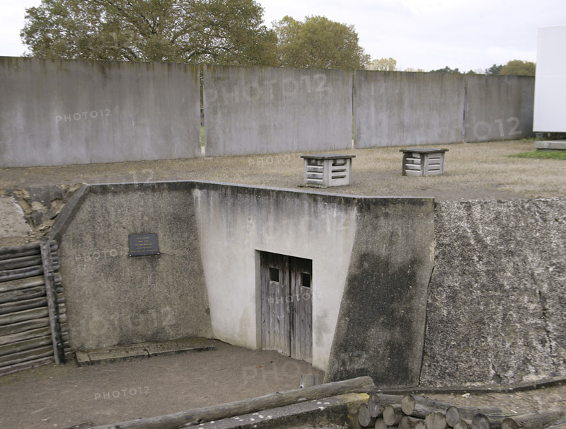 Oranienburg, Germany. Sachsenhausen concentration camp. It was created by the SA in March 1933, north of Berlin. It was in operation under the Nazi regime from July 1936 until April 1945. Sachsenhausen was a labour camp with several subcamps, a gas chamber, and a medical experimentation area. It was initially designed to held the large number of political prisoners who opposed the Nazi regime. From 1938 onwards, it began to held thousands of Jews. From 1940 onwards, Poles were also sent to Sachsenhausen, and from 1941 onwards, captured Soviet soldiers. Execution area. Door through which the firing squad appeared.