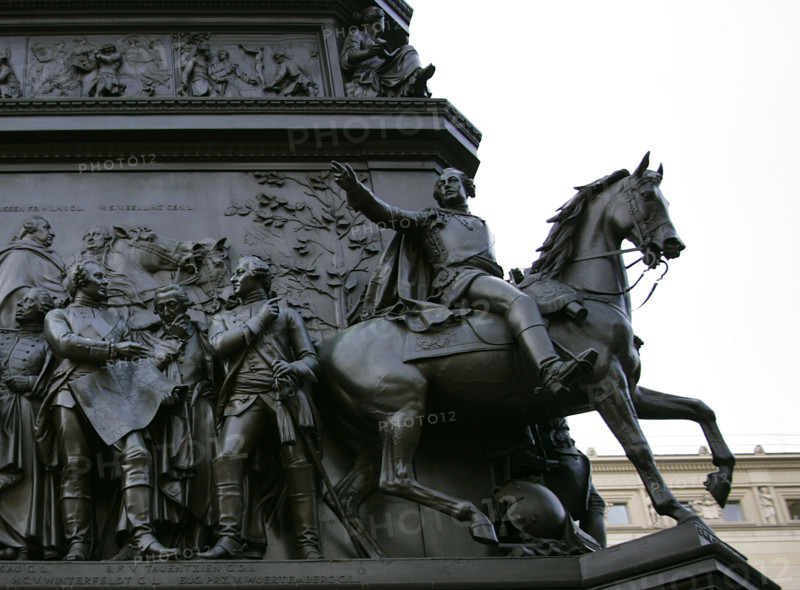 From left to right: Hans Karl von Winterfeldt (1707-1757), Prussian General; and Frederick II Eugene (Friedrich Eugen) (1732-1797), Duke of Wurttemberg. Behind both, Prussian General Friedrich Bogislav von Tauentzien (1710-1791). On the left, on horseback, Friedrich Wilhelm von Seydlitz (1721-1773), Prussian cavalry general. Figures from the monument to Frederick the Great, erected on Unter den Linden Avenue, Berlin, Germany. Made in bronze between 1839 and 1851 by German sculptor Christian Daniel Rauch (1777-1857).