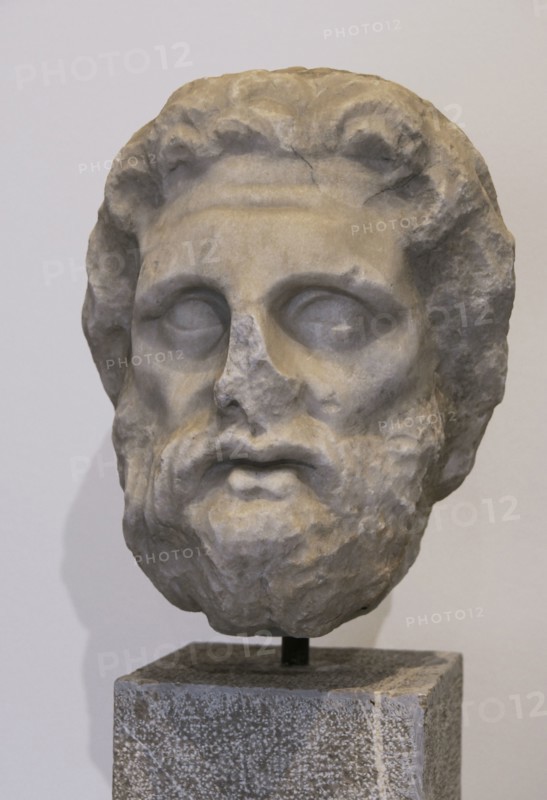Ancient Greece. Male head from a grave naiskos, ca. 330 BCE. Archaeological Museum of Piraeus. Greece.