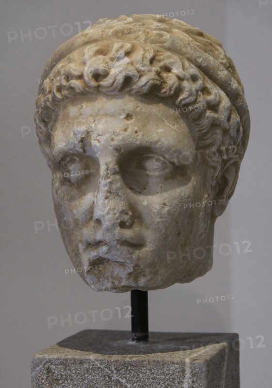 Crowned head of a young man, probably from a Hellenistic ruler's statue. 3rd century BC. Archaeological Museum of Piraeus. Greece.