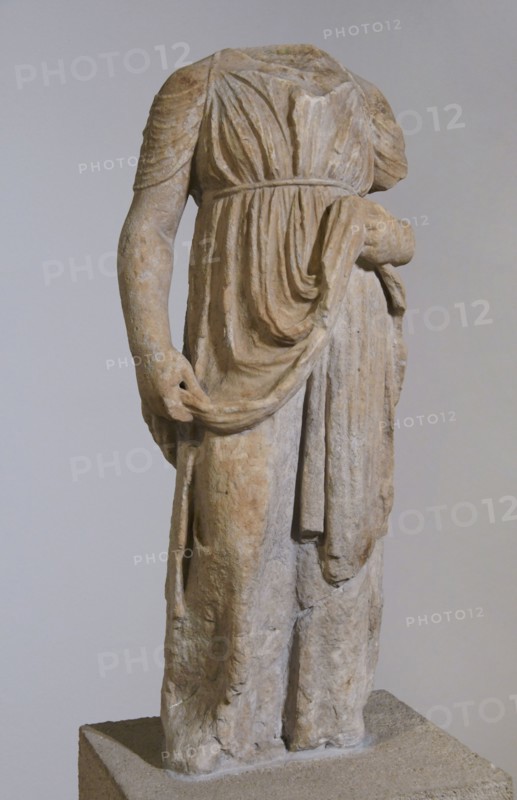 Ancient Greece. Statue of a young girl. Dated to the last quarter of the 4th century BC. Archaeological Museum of Piraeus. Greece.