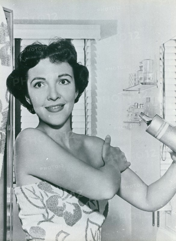 Nancy Davis (later Reagan) in advertisement for shower products