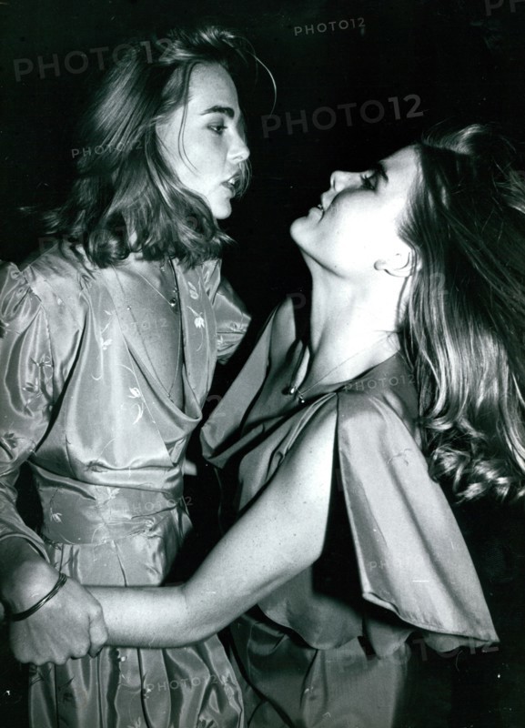 Margaux Hemingway and sister Mariel Hemingway dancing