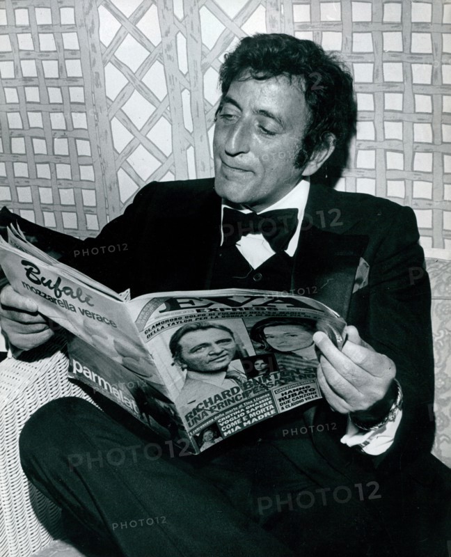 Tony Bennett relaxing at home reading a magazine