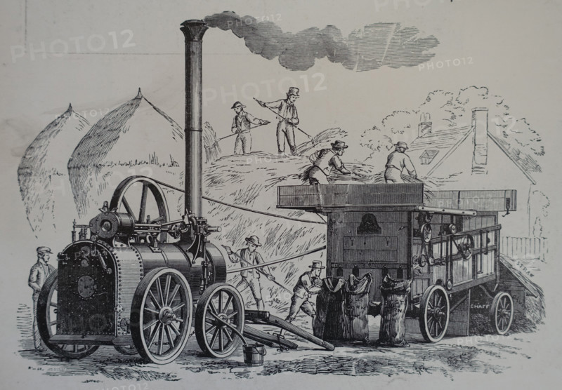 Steam-powered threshing machine