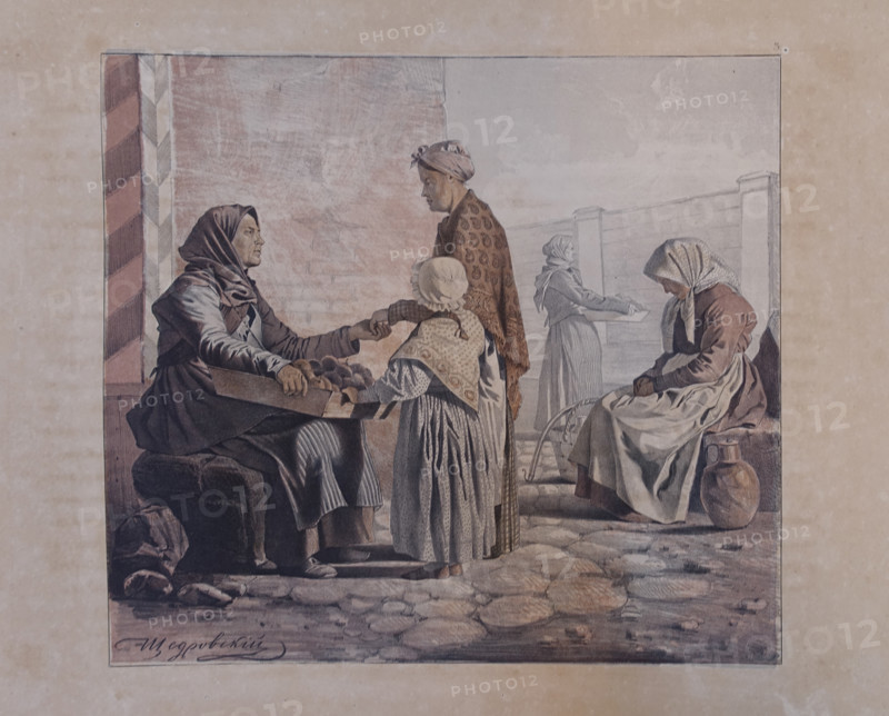Woman selling spoiled oranges