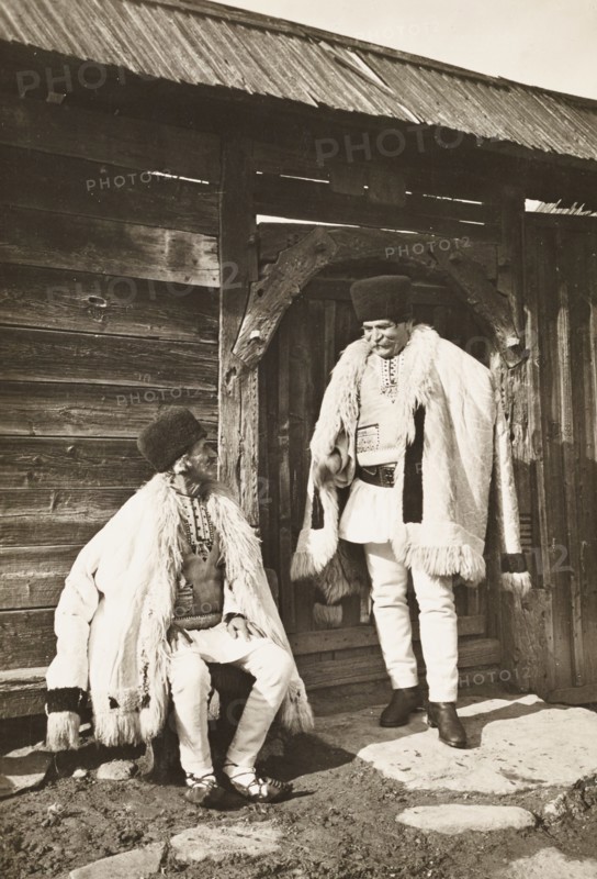 Two Romanian shepherds in traditional clothes in Transylvania