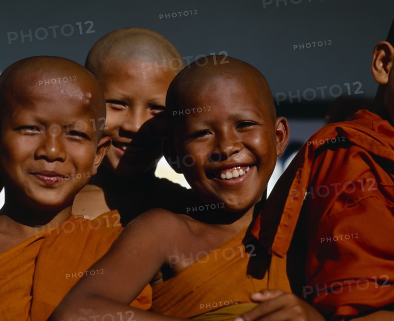 THAILAND, South, Phuket, Group of smiling novice Buddhist monks