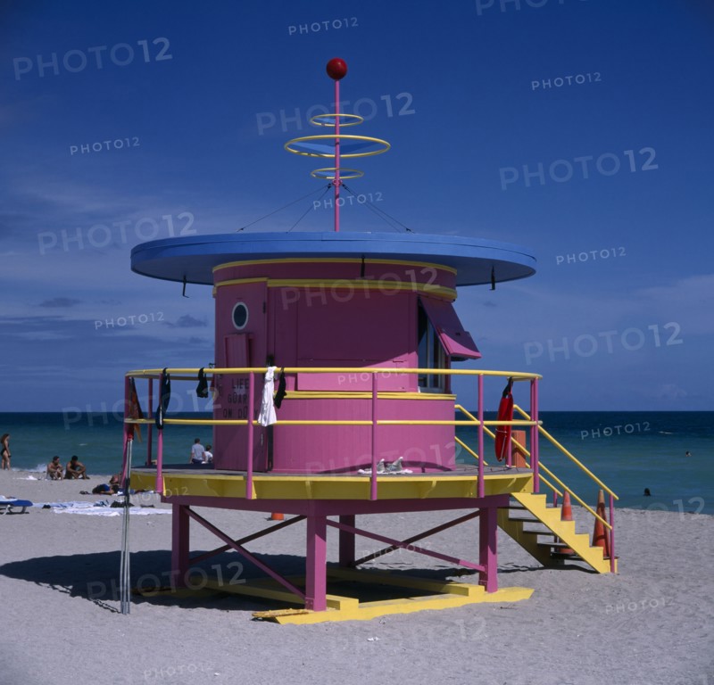 USA, Florida , Miami,  South Beach. Colourful Lifeguard tower on sandy beach