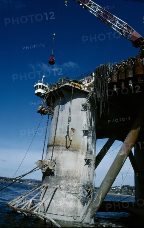 INDUSTRY, Factory, Oil Rig, Billy Pugh. Crew embarking on to the platform from a crane