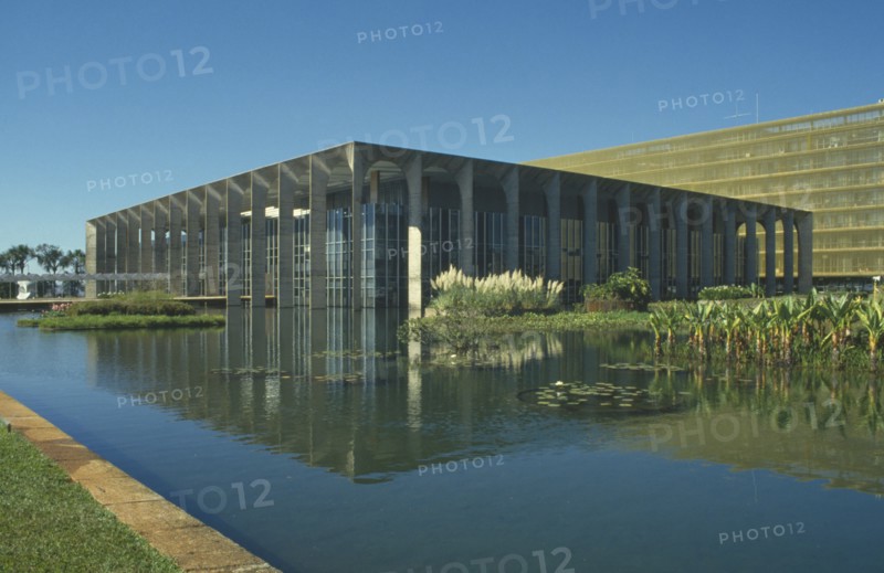 BRAZIL, Goias, Brasilia, Hamarti Palace seen across pool