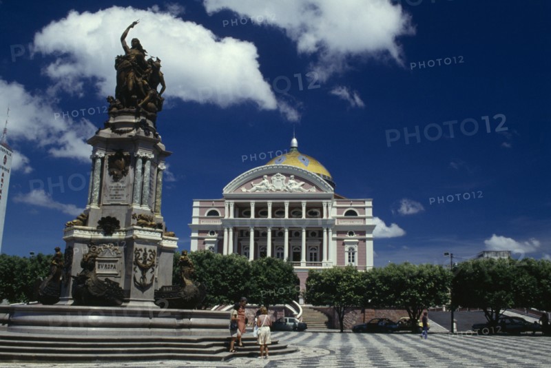 BRAZIL, Amazonas, Manaus, Opera House ornate exterior seen over square with central column and statue atop