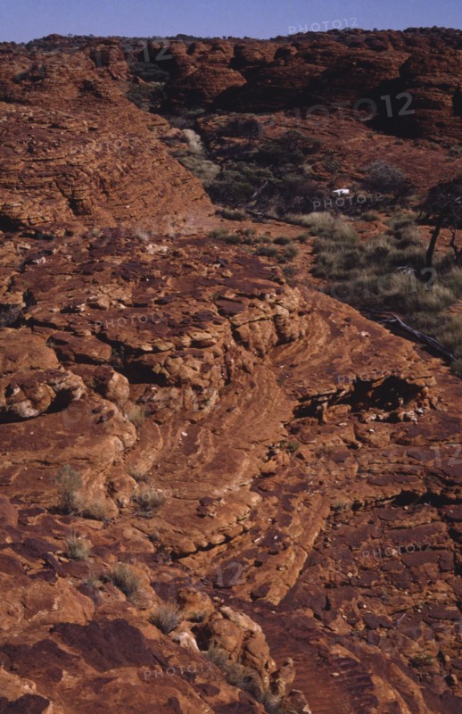AUSTRALIA, Northern Territory, Kings Canyon, View over ridge of red rock canyon landscape