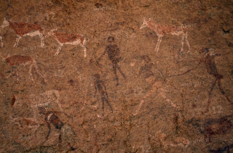 NAMIBIA, General, Bushman rock painting depicting men with spears and cattle