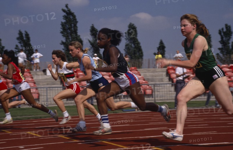 10018120 SPORT Athletics Track Teenage girls in track event in school championships.