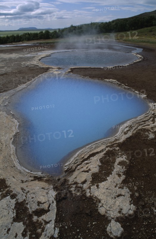 ICELAND, Landscape, Thermal pool with rising steam.