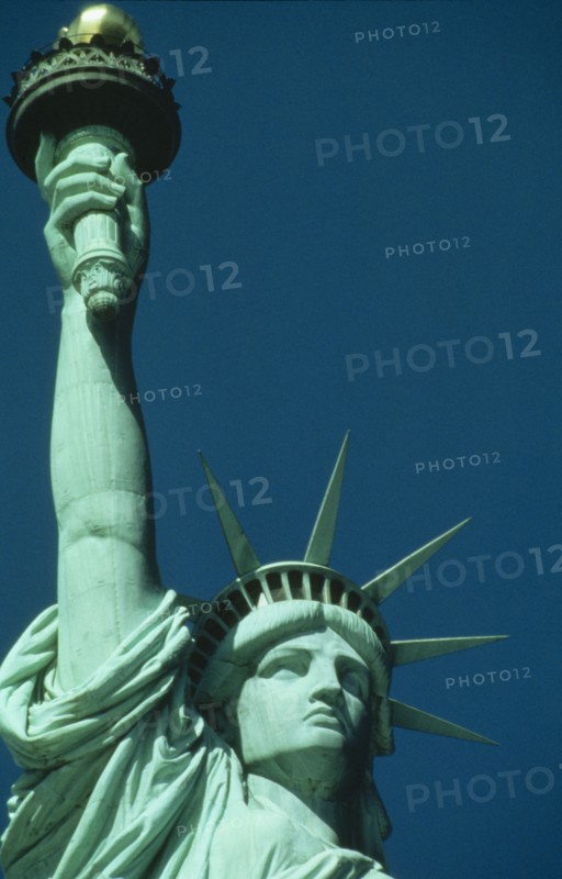 USA, New York State, New York, Cropped shot of Statue of Liberty detailing head and raised arm.
