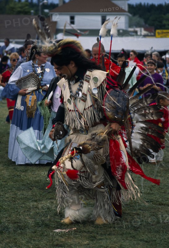 CANADA, Tribal People, Ojibway Tribe, Man dressed in full regalia taking part in Pow Wow