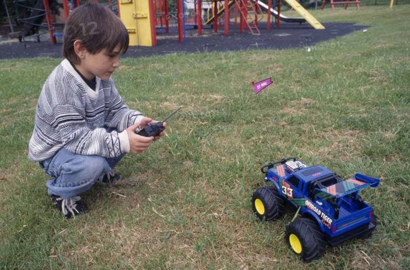 CHILDREN, Playing, Outdoor,  Boy with remote controlled truck.