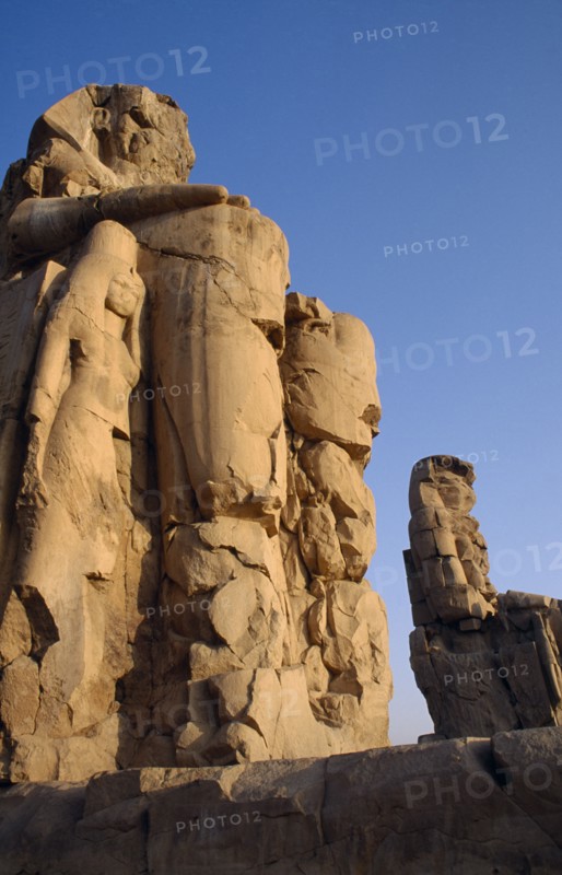 EGYPT, Thebes, The Colossi of Memnon the only remains of the Mortuary Temple of  Amenophis III