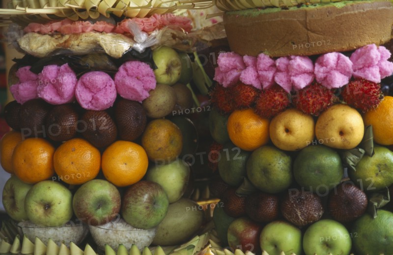 INDONESIA, Bali, Ubud, Temple offerings of fruit arrangements