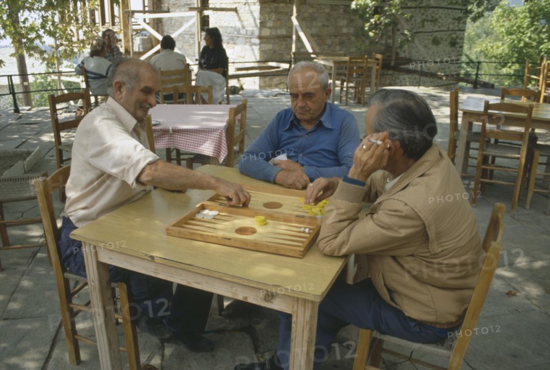 GREECE, Daily Life, Men Playing Backgammon outydoors