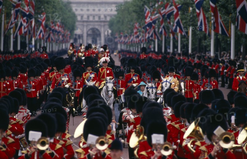 SOCIETY, Military, Army, The Queen and Prince Phillip returning down The Mall with Guardsmen after Trooping The Colour Ceremony