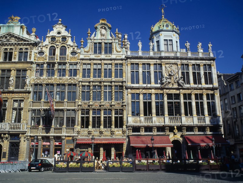 BELGIUM, Brabant, Brussels, "The Grand Place, west side facade with outdoor restaurants."