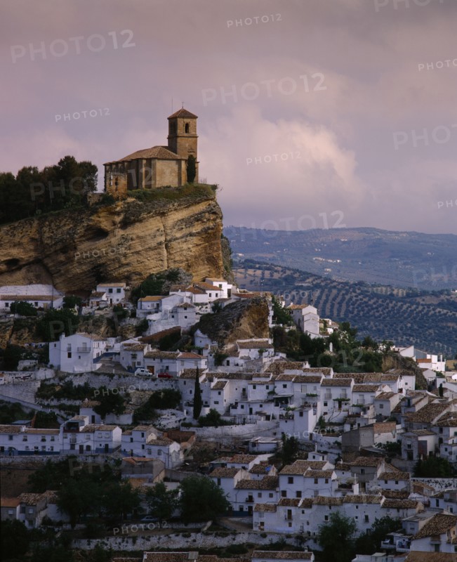 SPAIN, Andalucia, Granada Province, "Montefrio, general view of hillside town with white houses & church on hilltop "