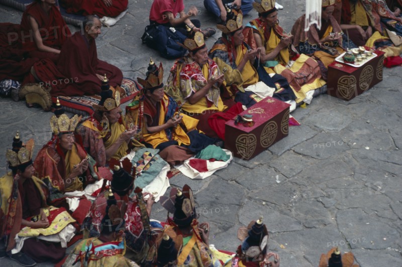 TIBET, People, Men, Monks chanting during Buddhist ceremony.