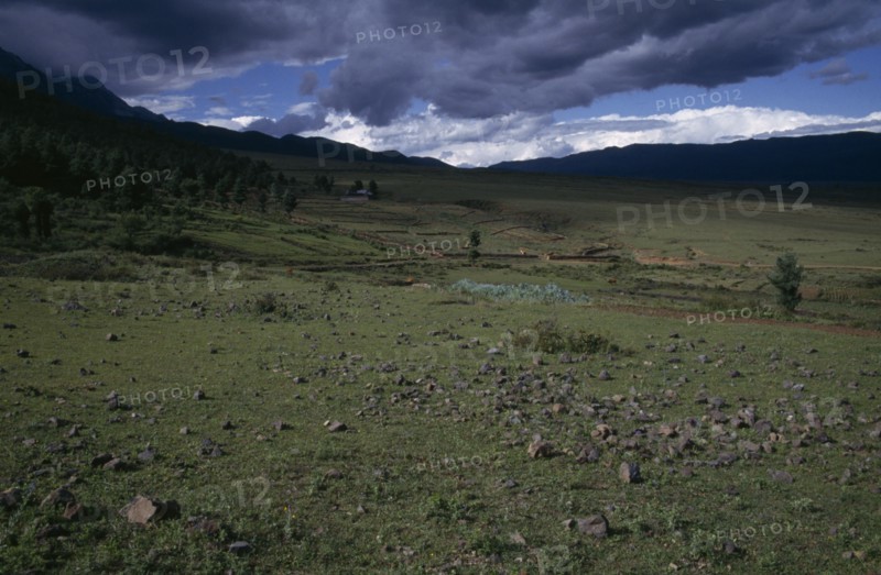 CHINA, Yunnan, Near Lijiang, "Landscape at the foot of Jade Dragon Snow Mountain, also known as Mount Satseto"