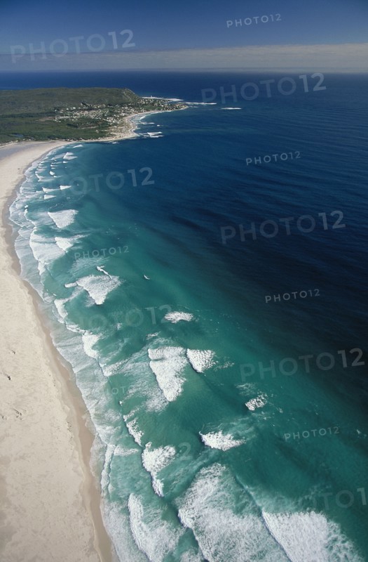 SOUTH AFRICA, Cape Province, Cape Town, View along Noordhoek Beach with waves rolling into the empty beach
