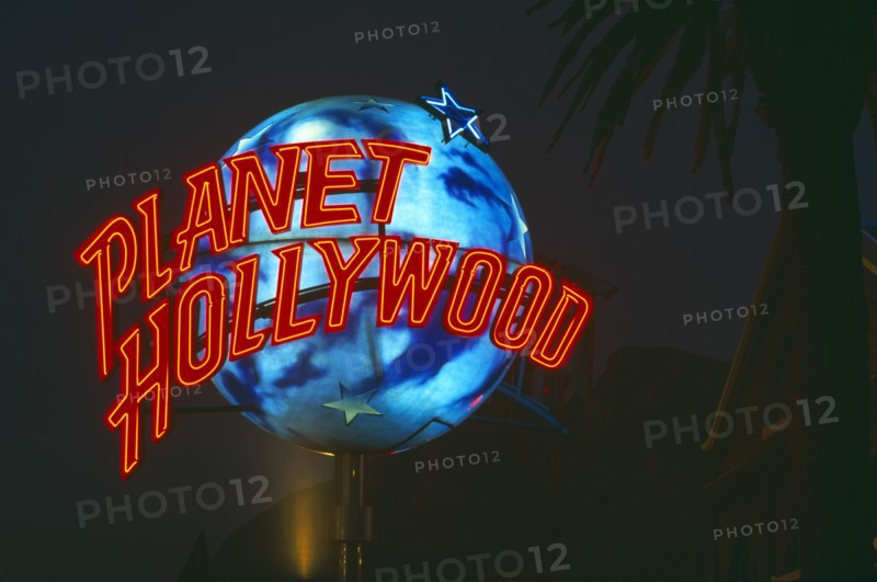 SOUTH AFRICA, Cape Town, "V&A Waterfront, a rotating 'Planet Hollywood' logo infront of new resturant taken at night.  "