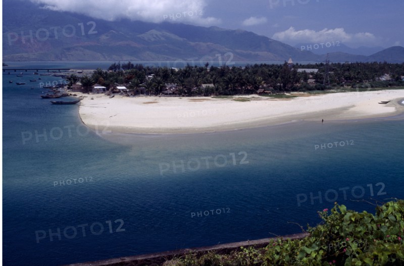 VIETNAM, Lang Co, View over beach and lagoon with moored boats
