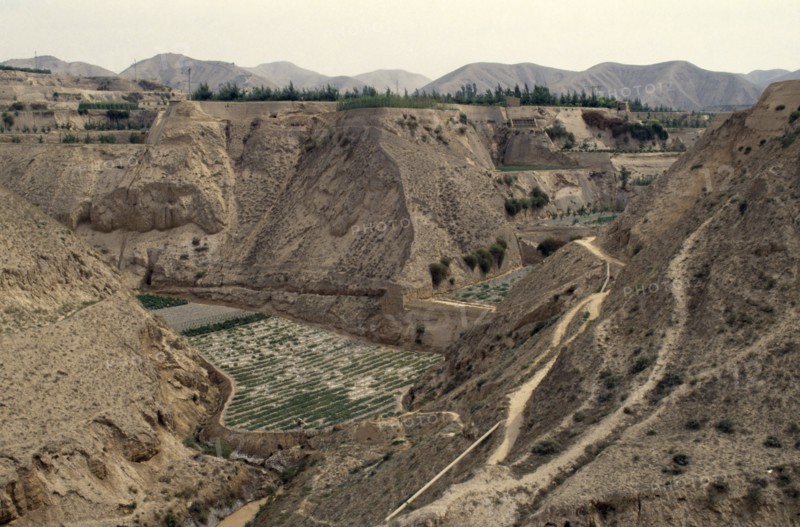 CHINA, Gansu, Lanzhou , Loess eroded valleys and terracing for crops.