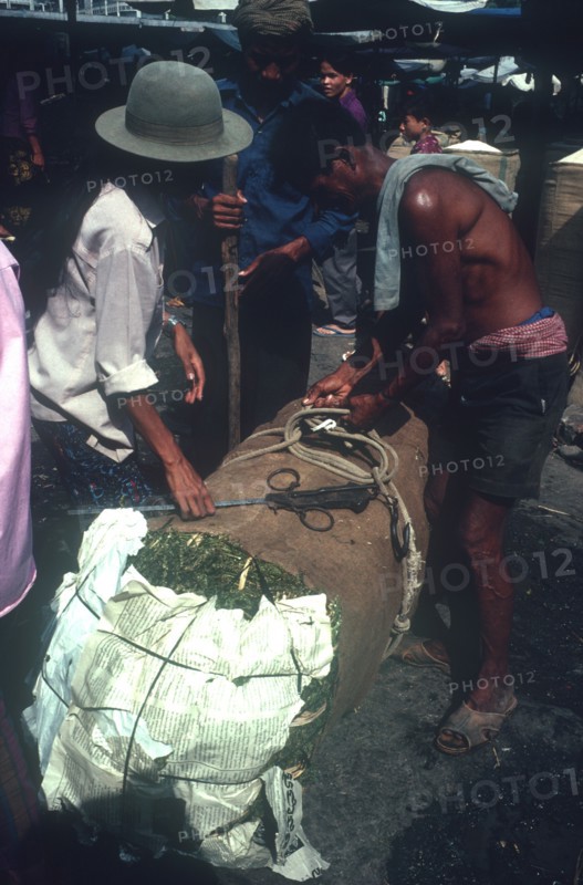 CAMBODIA, Phnom Penh, Kompong Thom marijuana in 50kg bale at market.