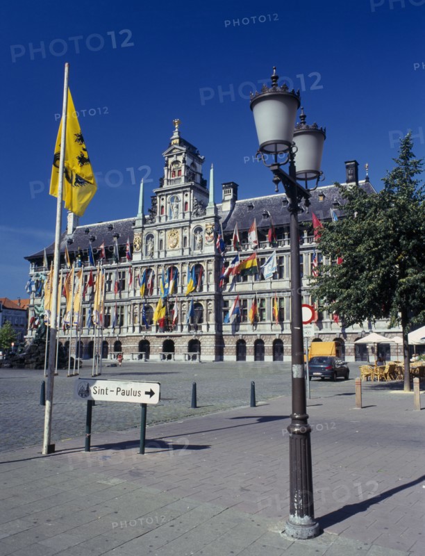 BELGIUM, Flemish Region, Antwerp, "Town Hall and Main Square, Grote Markt, with a lamppost and flag in the foreground."