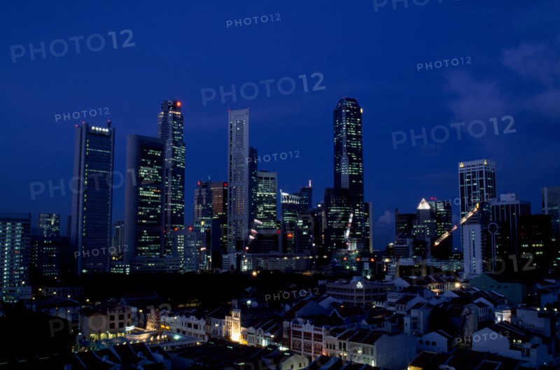 SINGAPORE, Raffles Place, City skyline illuminated at night